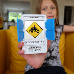 100 PICS US Road Signs slide reveal case shows interactive quizzes during play.