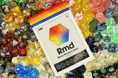 1985 Games Sharp Edge Dice Set resin with vibrant color on tabletop for dramatic effect.
