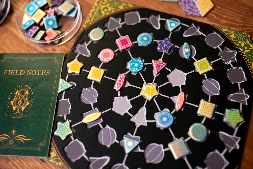 Diatoms colorful tiles illustrating the artful components from 25th Century Games