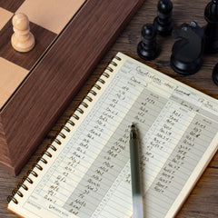 A&A chess scorebook interior with clear grids for easy move logging