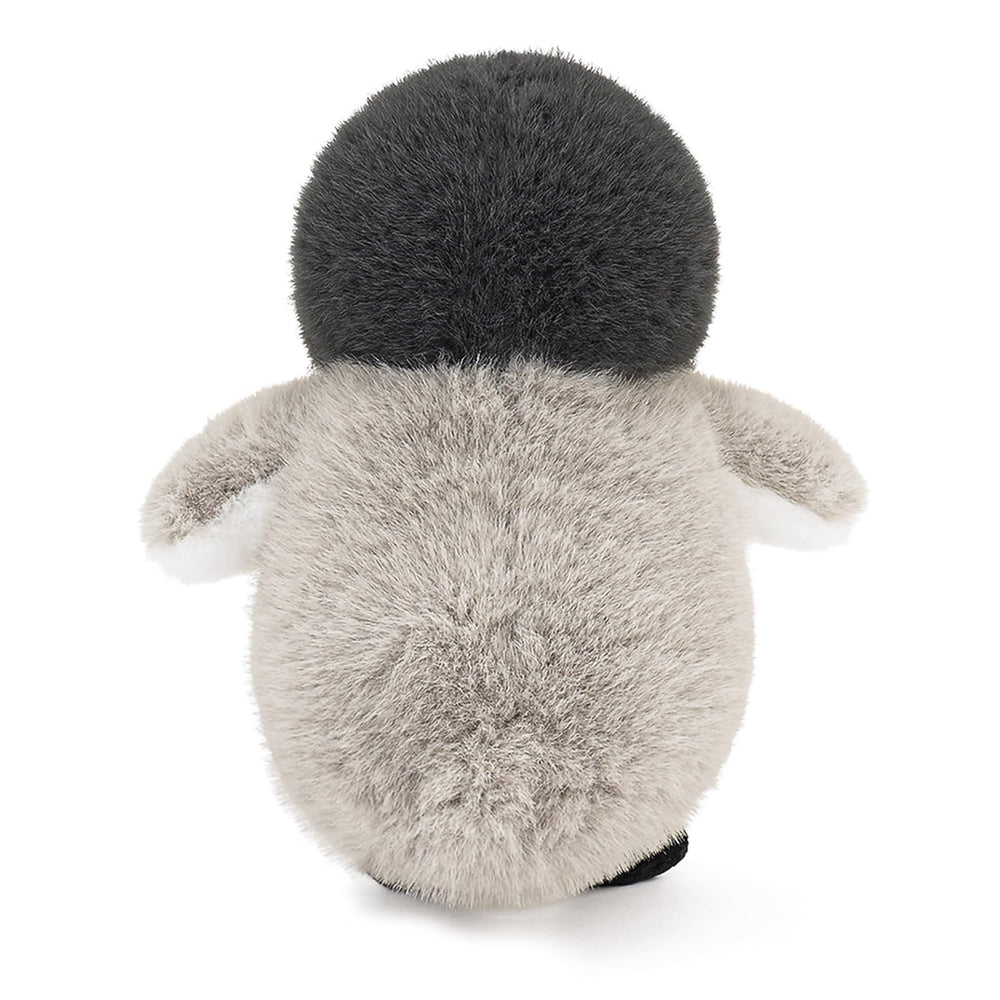 ABEARCAR Penguin Plush on bed for cozy cuddle time