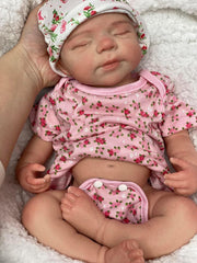 Abenduot doll with rosy cheeks enhances lifelike newborn appearance.
