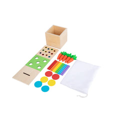 Adena Montessori matchstick color drop game in action, improving hand-eye coordination.