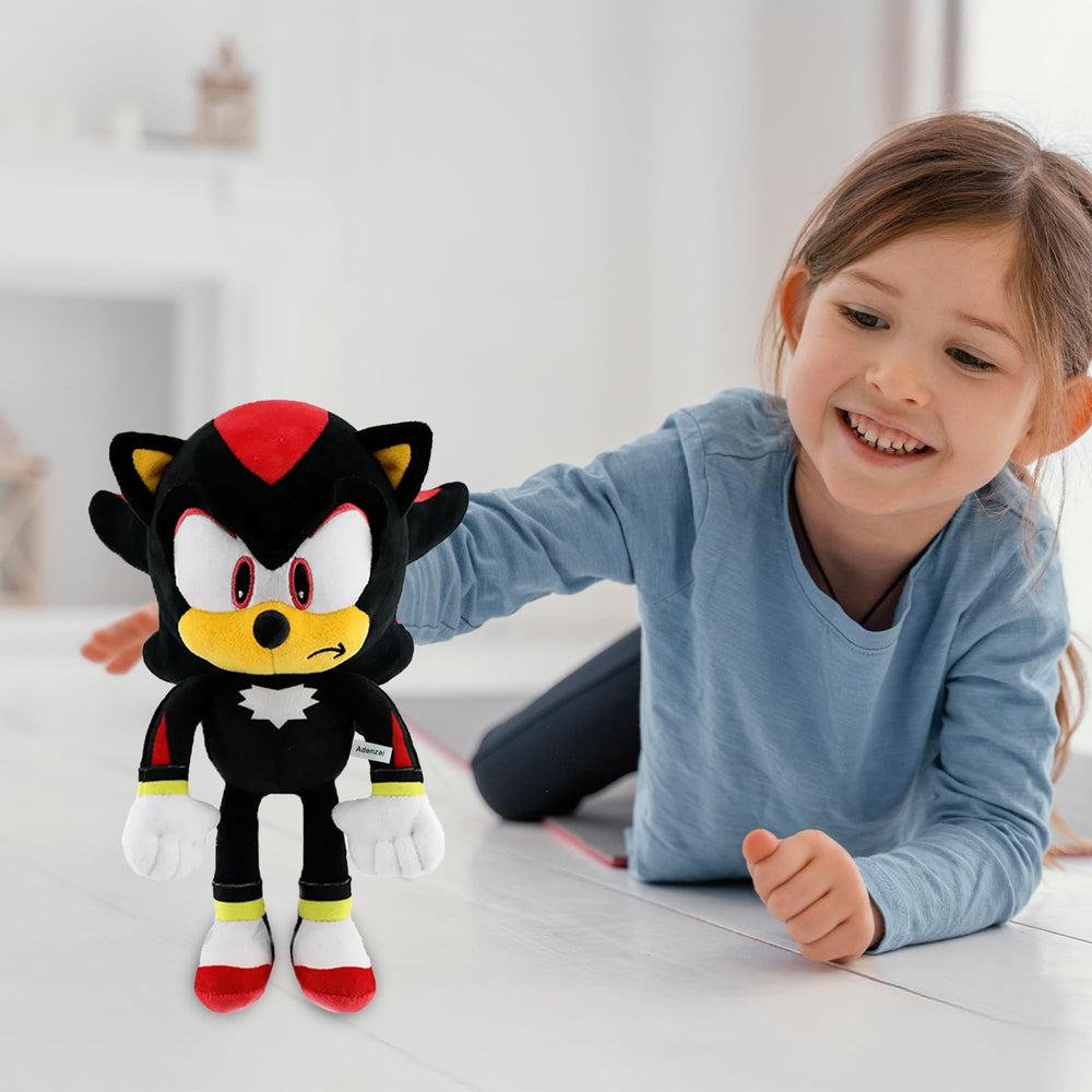 Adenzai Black Plush Toy tucked into a cozy corner for comforting company