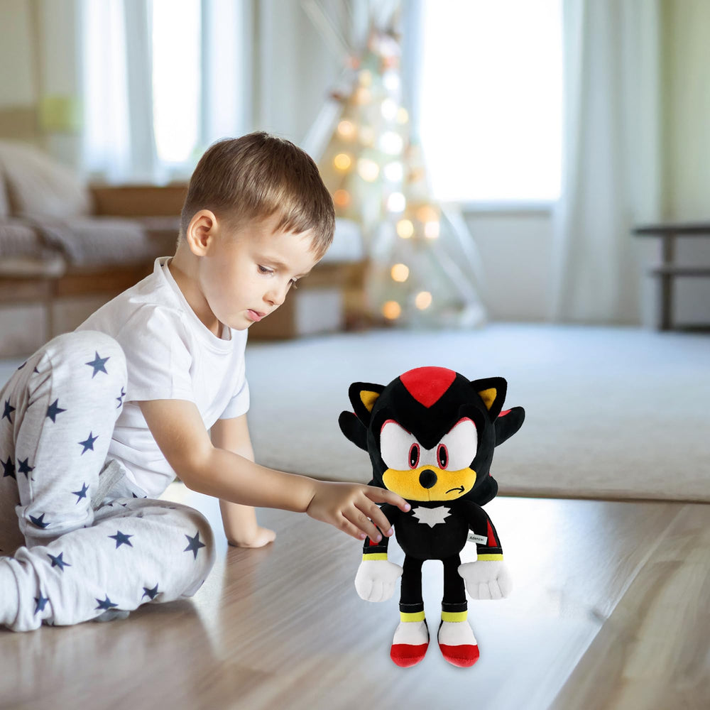 Adenzai Black Plush Toy alongside other plush figures for sharing play