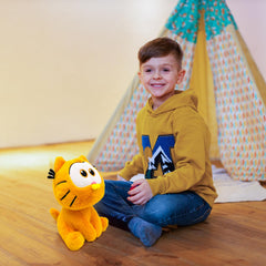 Adenzai Garfield plush being hugged by a child for comforting companionship.
