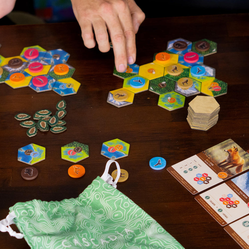 AEG Cascadia card and tile stack showing easy-to-teach system.
