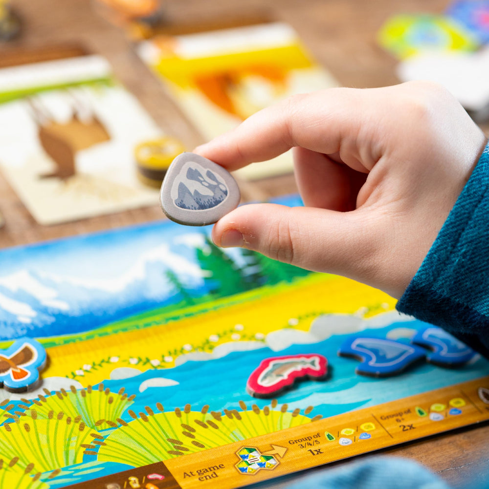 AEG Cascadia Junior game board setup showing a family-friendly layout