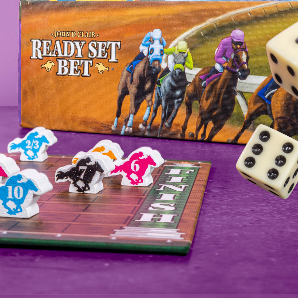 AEG Ready Set Bet race-style table layout with dice and chips in action.