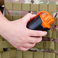 Aevdor Tactical Grenade in hand ready to throw during practice