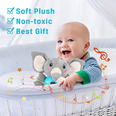 Aitbay plush elephant toy glowing softly during playtime.