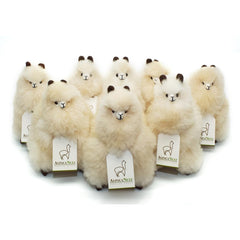AlpacaNext nine-inch plush, compact and portable for travel or couch cuddles.