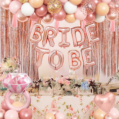 Amandir gold rose gold confetti balloons bring shimmer to the event.