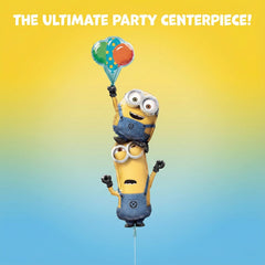 Anagram Minions Stacker Balloon accents the cake table setup.