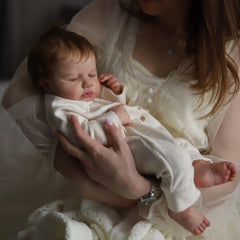 Anano Loulou 20in face detail showing lifelike realism for gentle imaginative play