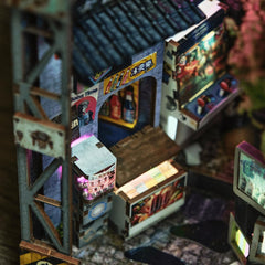 Anavrin Book Nook Kowloon materials blend wood, paper, acrylic for tactile detail.