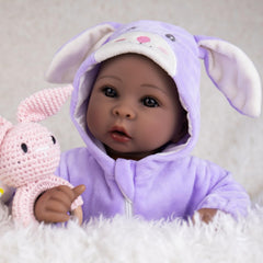 Aori Black Baby Doll with hand-painted eyelashes and rosy lips for realism.