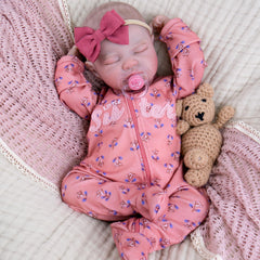 Aori lifelike reborn doll with weighted body for authentic cuddling experiences.