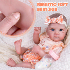 Aori Reborn doll eyelashes and hand-painted detail enhance realism during imaginative care.