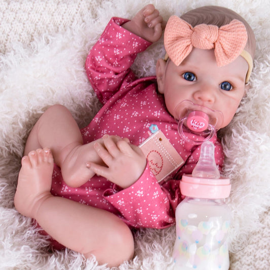 Aori Reborn Baby Doll Girl face close-up with hand-painted features for lifelike charm.