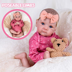 Hand-painted lashes and rosy lips on the Aori Reborn Doll for lifelike play.