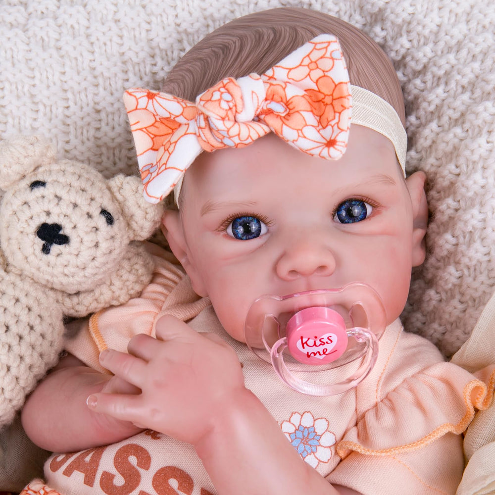 Aori Reborn doll poseable limbs enable easy dressing and interactive pretend play.