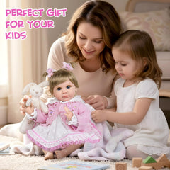 Aori Reborn 22-inch doll during dressing session highlights easy wardrobe changes.