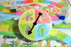 Apostrophe Games sand timer adds a tactile time limit for fast-paced rounds.