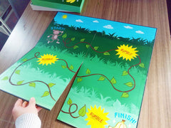 Apostrophe Games quad-fold board demonstrated for portability.