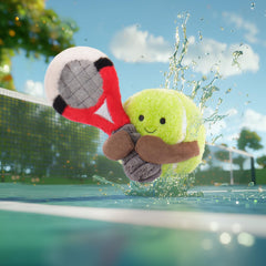 Apricot Lamb Happy Tennis being held by a child for gentle bonding
