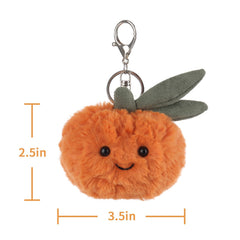 Apricot Lamb orange plush keychain held beside hand for scale, petite size.