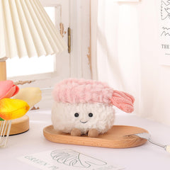 Apricot Lamb sushi plush in a child’s hand, ideal for imaginative play.