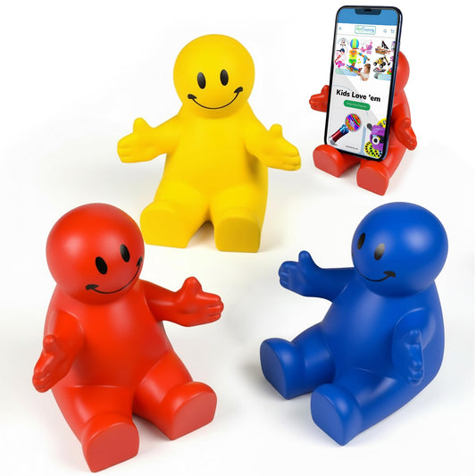 ArtCreativity smile phone holder in red shines on a clean desk, perfect for keeping devices within easy reach.