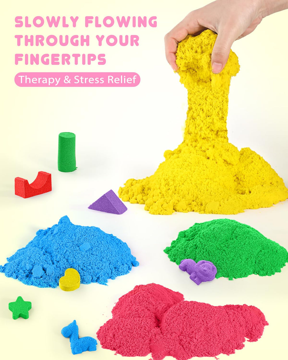 AtMini child enjoying creative sand modeling with colorful pieces