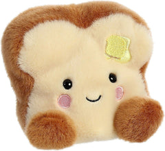 Close-up of Aurora Buttery Toast face, warm smile for cozy storytelling.