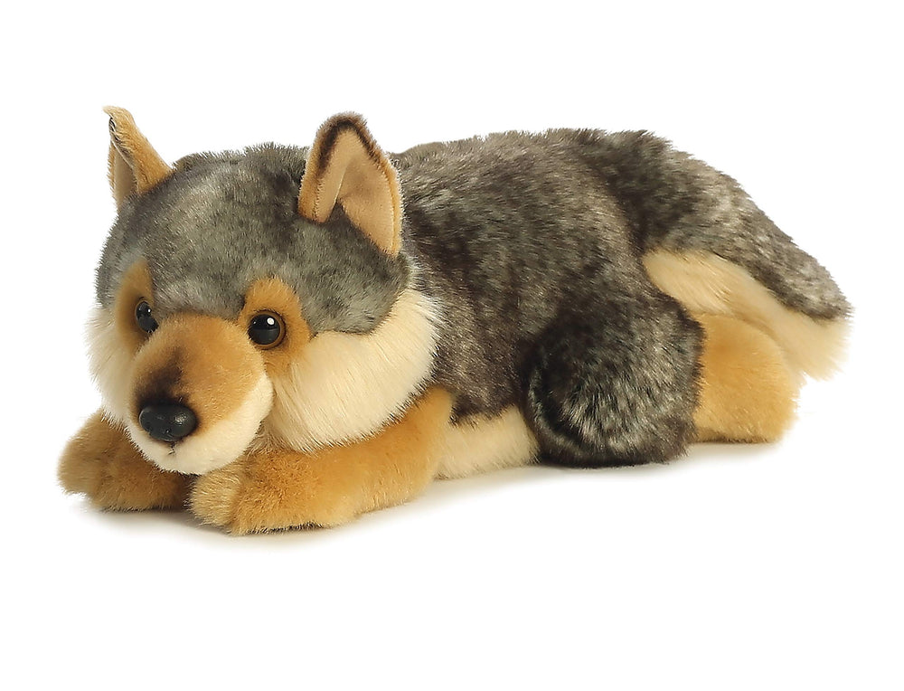 Aurora Miyoni lying wolf hand-stitched detail, handmade charm on shelves.