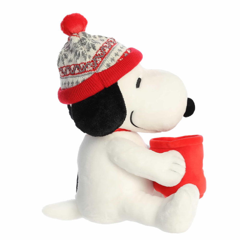 Aurora Snoopy plush with knitted hat close-up highlights soft fabric and bean-filled stability.