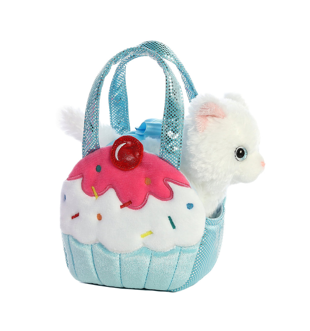 Aurora Sweets Kitty plush in cupcake-inspired bag for imaginative play.