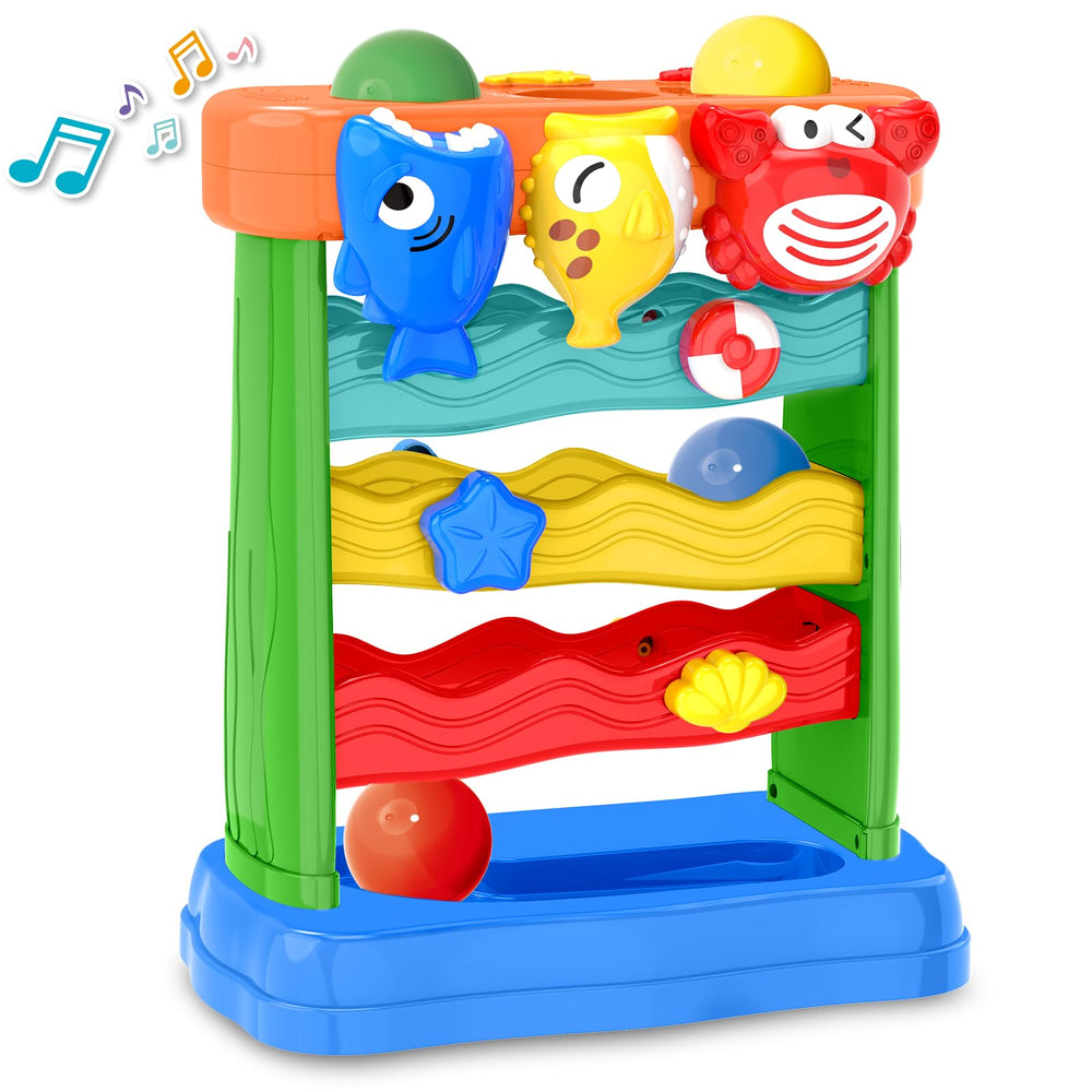 AuroTops blue shark ball-drop toy lights up playtime, boosting early learning.