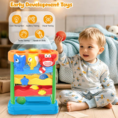 AuroTops ball-drop toy includes four colorful balls for varied play.