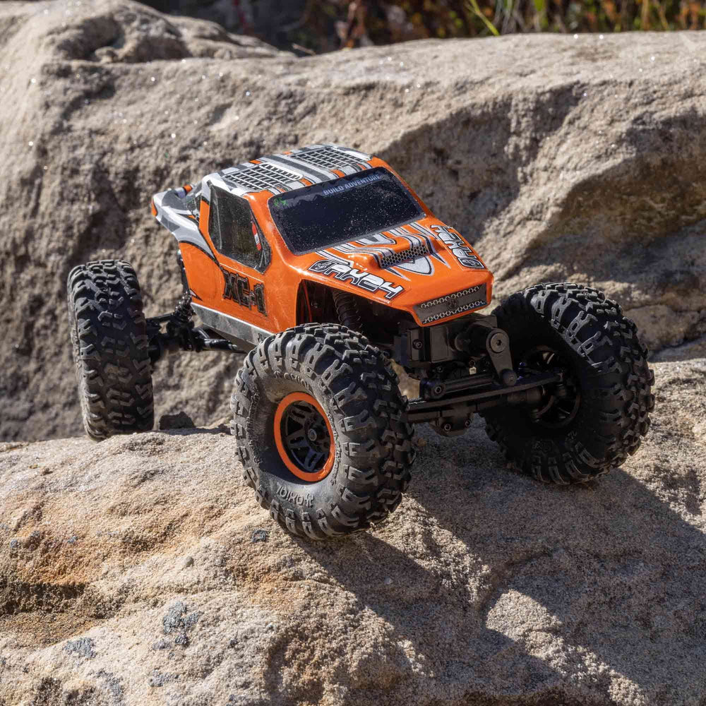 Axial AX24 XC-1 rockster wheels maximize traction on rocky trails.