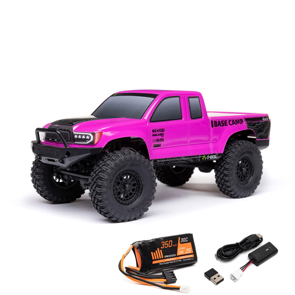 Axial Base Camp pink truck side view with scale styling for display or trail play