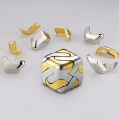 AZG Go 3D brain teaser silver cube enhances focus during work.