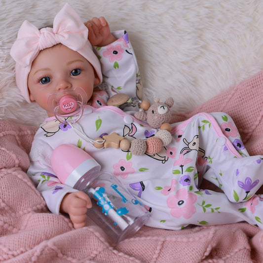 BABESIDE 18-inch reborn doll girl in bunny outfit ideal for imaginative play and cuddling.