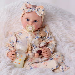 BABESIDE birth certificate and rattle set enhance storytelling.