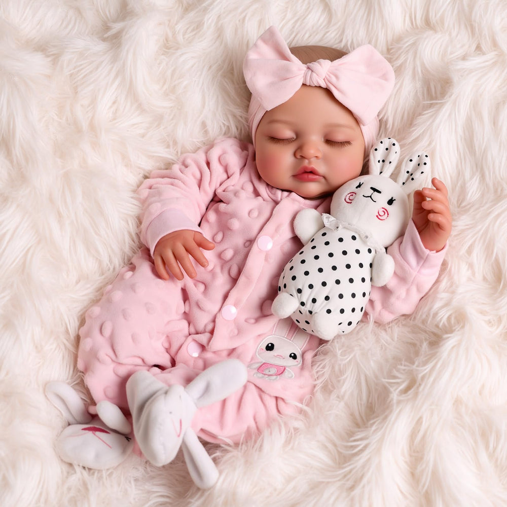 BABESIDE bunny outfit on the 18-inch reborn doll for gentle imaginative play.
