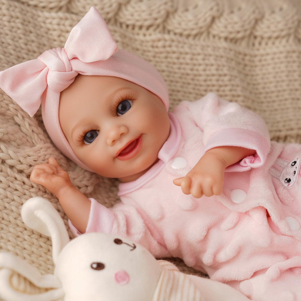 Babeside curled hands and preemie look enhance lifelike charm.