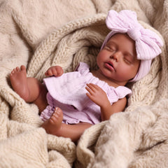 BABESIDE Daisy includes a pacifier for nurturing pretend play.