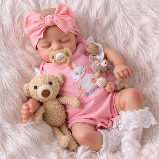 BABESIDE lifelike 17-inch doll posing for cuddles and imaginative play.