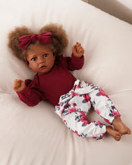 BABESIDE floral pattern pants add playful detail to 17-22 inch dolls.